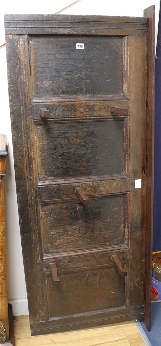 A 17th / 18th century oak hall rack, W.154cm